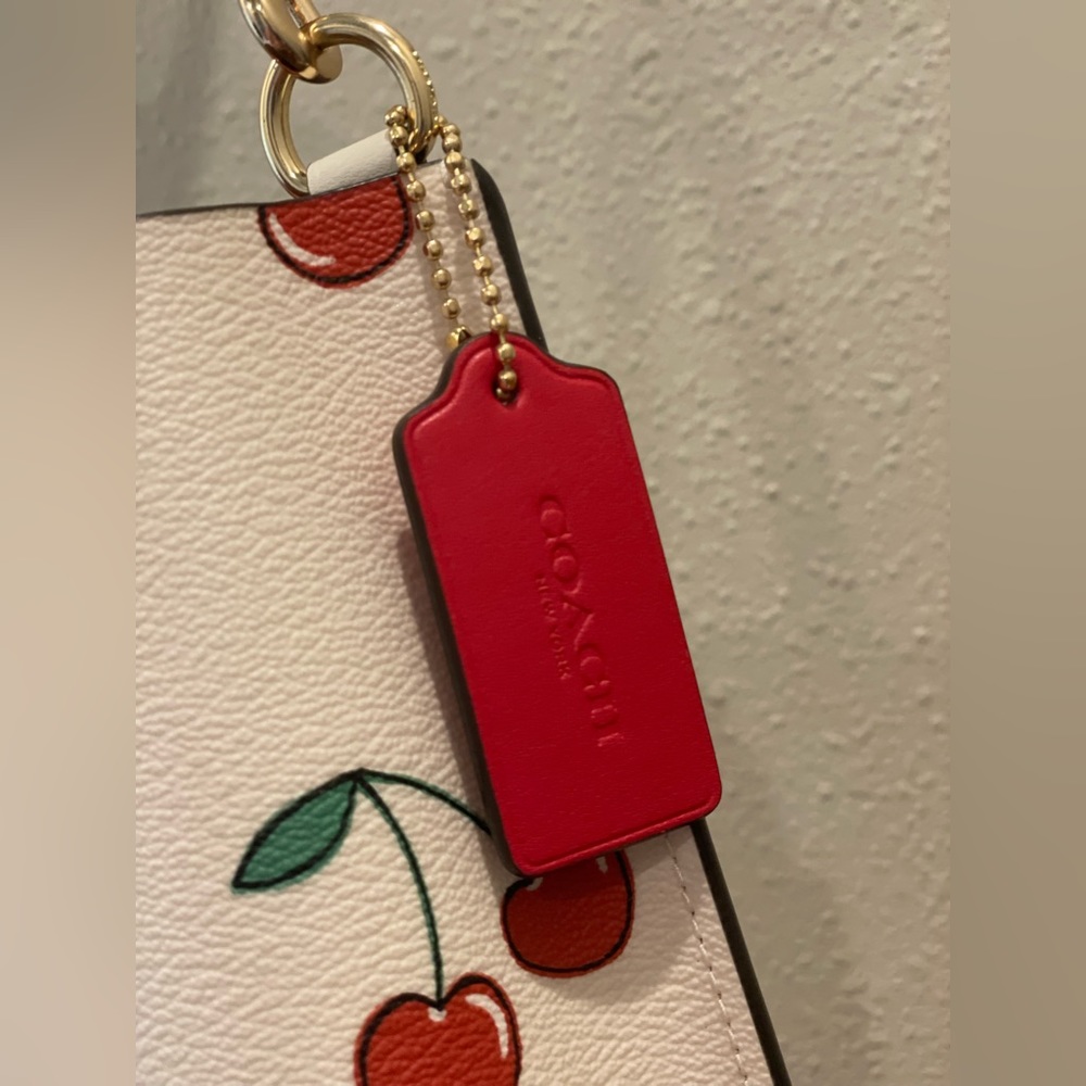 Coach White Cherry Print Crossbody Bag with Red Accents - Picture 5 of 16